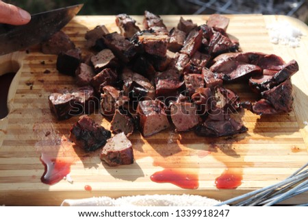 Different types of meat  And liver are cooked on the grill - close up In rural Morocco Fez