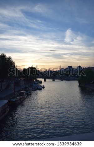 Skyline and sunset in Paris  Royalty-Free Stock Photo #1339934639