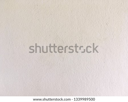 Vintage yellow cement wall background 
