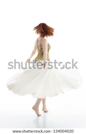 Spinning Redheaded Dancer on White