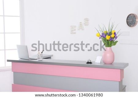 Modern reception desk in beauty salon. Stylish interior