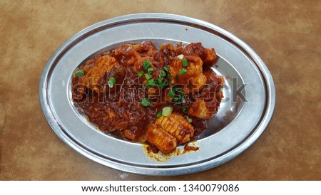 Stringray Stir Fried with Sambal Chilli Paste Royalty-Free Stock Photo #1340079086