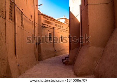 Narrow deserted street close up of a traditional Berber city. Africa Morocco Ouarzazate