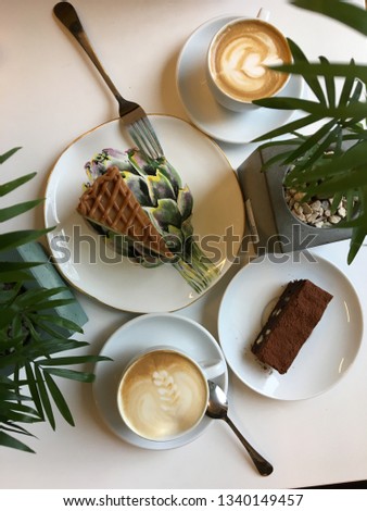 Stock photo of morning cake and coffee flat lay in restaurant