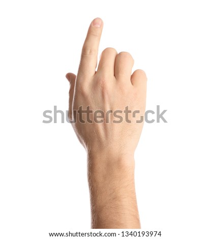 Man pointing at something on white background, closeup of hand Royalty-Free Stock Photo #1340193974