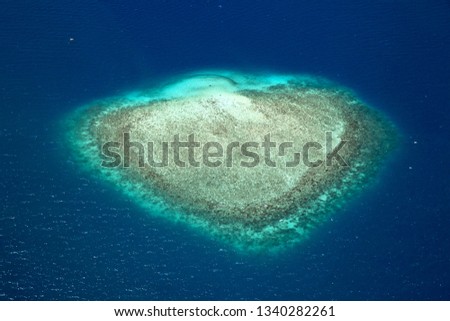 A heart shaped coral Island between Cebu and Bohol Island in Philippines. Royalty-Free Stock Photo #1340282261