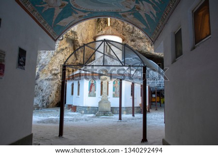 Ialomitei cave and monastery, Bucegi mountains, Saints Peter and Paul Church at the entrance, A cave in Bucegi Mountains, Carpathians, Romania