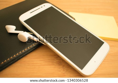 Phone headphones notepad
