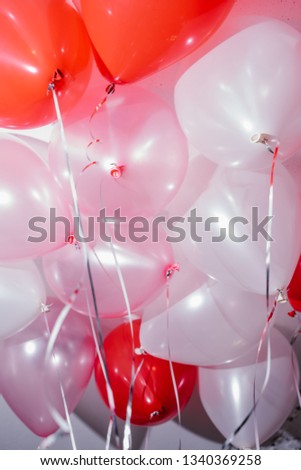 balloons with a ribbon on a holiday with gas helium