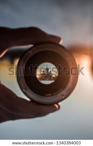 a picture of a church shot through a lense , started seeing the world from another angle and another perspectives through lenses and glass and trying to continue being creative