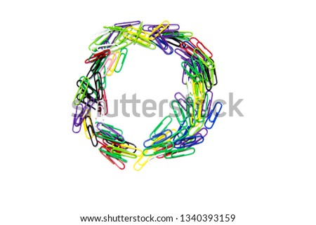 The letter "O" or "Zero" of color clips, with a soft blur at the bottom, on a white background