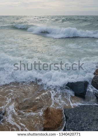 Winter Waves Crashing on Rocks