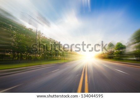 road under blue sky