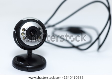 Webcam with wire on white background with light shadows