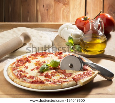 pizza on the table with ingredients