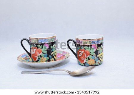 Mock up / design set of elegant and traditional colorful coffee cup & Tea cup on cup's plate , drink-ware , kitchen isolated on white background 