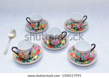Mock up / design set of elegant and traditional colorful coffee cup & Tea cup on cup's plate , drink-ware , kitchen isolated on white background 