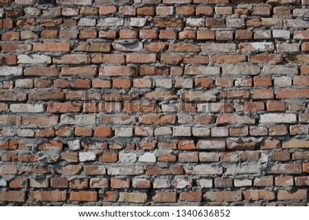 Brick texture with scratches and cracks. Old vintage brick wall pattern.  Brick work background.