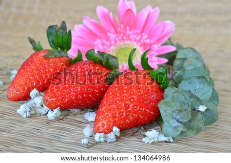 Strawberries on a mat background