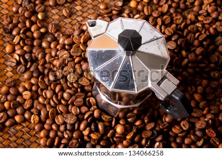 Espresso Maker on Coffee bean.