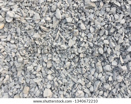 Texture of a gravel aggregate seamless background