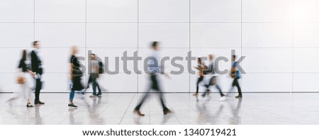 blurred business people at a trade fair Royalty-Free Stock Photo #1340719421