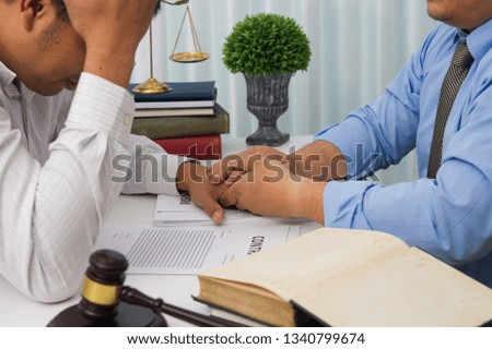 Judge gavel with scales of justice, Business people and male lawyers discussing contract papers at law firm in office. Concepts of law.