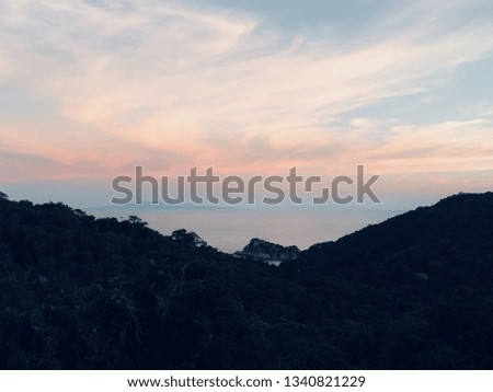 Pink twilight sunset sky panorama ocean view