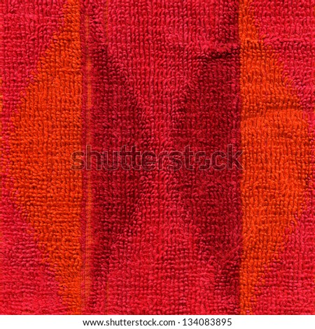 High resolution close up of a pink, red and orange towel cloth.