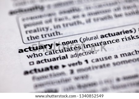 Blurred close up to the partial dictionary definition of Actuary Royalty-Free Stock Photo #1340852549