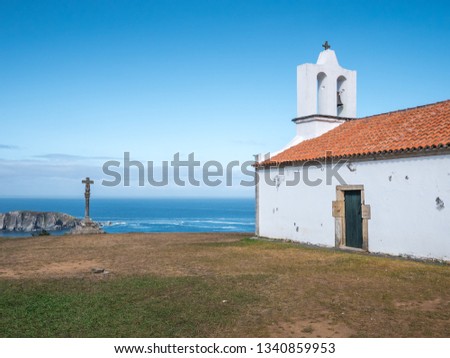 Wayside cross and chapel of San Antonio de Corveiro, Cedeira, Galicia, Spain Royalty-Free Stock Photo #1340859953