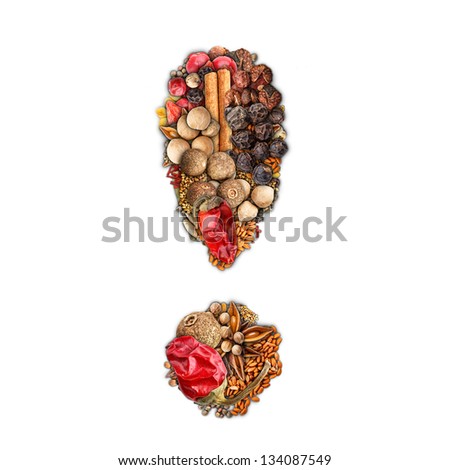 Exclamation mark made of spices isolated on white background