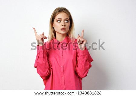  woman pointing her fingers to a free place                              
