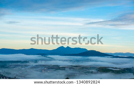landscape of dalat city, the beautiful morning in dalat, the fog and nice cloud in the city, fog and the green houses