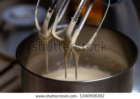 Stand mixer bowl with wire whip stopped