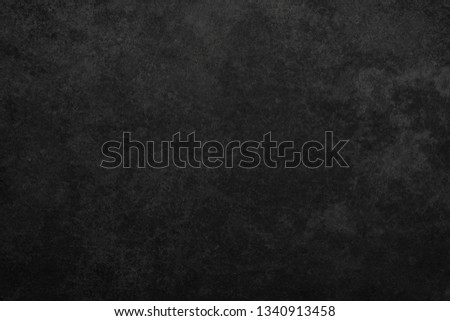 Grunge Background. Very dark gray concrete walll texture.  Royalty-Free Stock Photo #1340913458