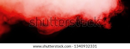 red smoke blow from exploration on dark background