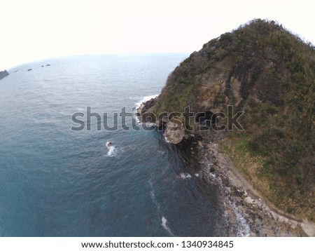 Japan Hyougo Toyooka city Takeno seaside Yodonodoumon sea cave drone shot
