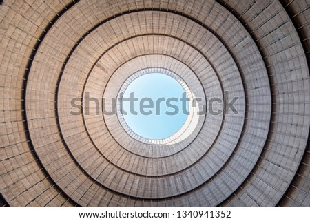 Charleroi, Belgium - 02 13 2019: Interior architecture view of a abandoned cooling tower in power plant of charleroi in Belgium Royalty-Free Stock Photo #1340941352