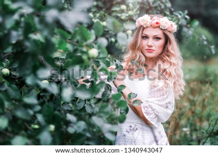 Bride with a wreath on her head outside
