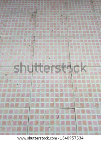 A dirty tile floor 