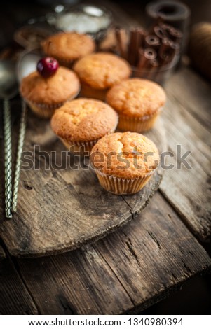 Homemade pastries - portion muffins on a wooden table. Simple cooking. Portion biscuit cupcakes.