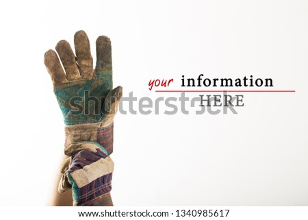 Man wearing a pair of protection gloves Royalty-Free Stock Photo #1340985617