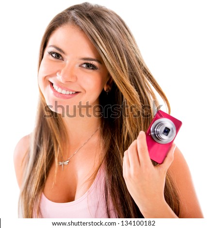 Happy woman with a small digital camera - isolated over white