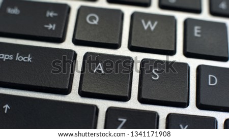 Laptop keyboard, feature for text typing and editing, typewriter-style device Royalty-Free Stock Photo #1341171908