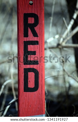 Wooden Sign with the word Red