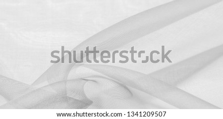 White silk fabric texture pattern. It is also perfect for your design, clothes, posters. Be creative with beautiful project accents. This fabric is inspired by your inspiration.