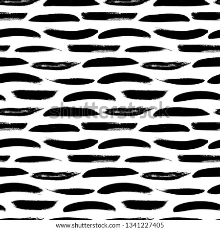Seamless pattern with horizontal brush strokes. Hand drawn feathers imitation. Ink lines texture. Modern monochrome background. Vector ornament for wrapping paper, wallpapers, web design etc.