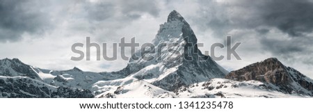 panoramic view to the majestic Matterhorn mountain, Valais, Switzerland Royalty-Free Stock Photo #1341235478