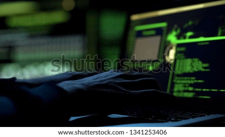 Male hands typing computer code, security program for database or servers